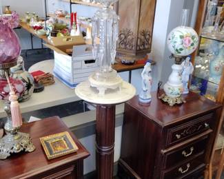 Night stands. in pedestals. with lots of goodies