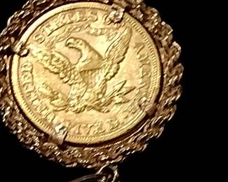 1880 $5 gold coin. With 14 karat bezel and 30" chain.
