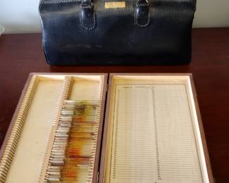 Awesome vintage Slide box with slides. from World War Two era. Everything from gonorrhea to cat testicles. I can't make this up lol.