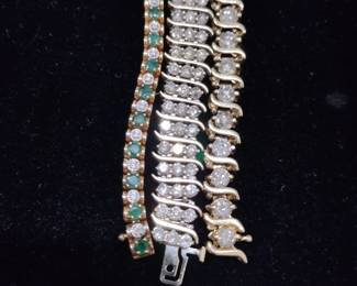 14 karat gold and diamond bracelets, one with emeralds.