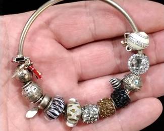 Pandora sterling charm bracelet with charms