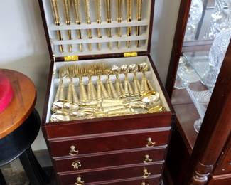 two sets Gold plated flatware 