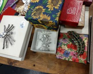 Costume jewelry brooches and more.