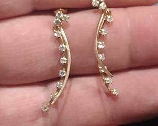 14 karat gold earrings. with diamonds
