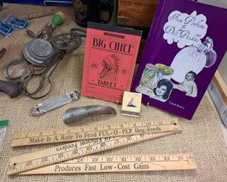 Local book "From Perfume To Dill Pickles" by Carol Bravo, "FUL-O-PEP" Quaker Oats ruler, "Country Club Beer" opener, "American National Bank" matches