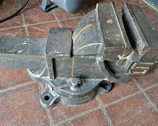 2 tables of tools. 5" bench vise