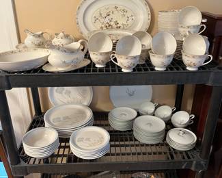 Two sets of dinnerware.