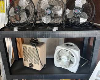 3 desk fans and two space heaters.