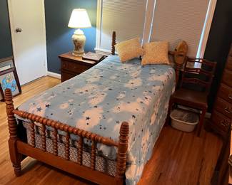Twin bed with Jenny Lynn headboard and footboard.