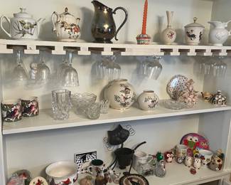 Cardinal, cats, and owl collectibles and variety of ceramic and glassware.