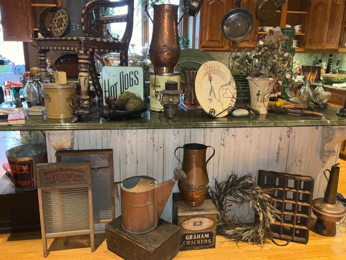 Antiques,  primitives,  copper pots, copper urns. Antique tins, glass washboard,  collectibles, 