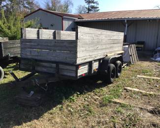 Double axle trailer 12 feet long, 80” wide, 4 foot sides. 