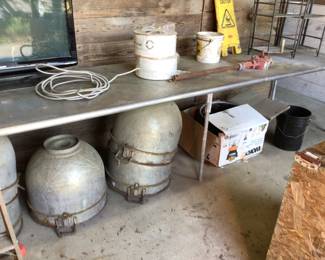 Stainless steel pots and 12 foot stainless table.