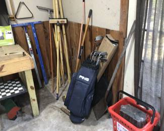 Yard tools and a set of Ping golf clubs