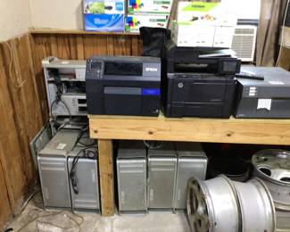 HP LaserJet pro printer, Epson color works 6500 au printer, and Apple computers