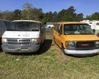 White van is 2002 Dodge. Have title. Do not have title for Yellow van. 