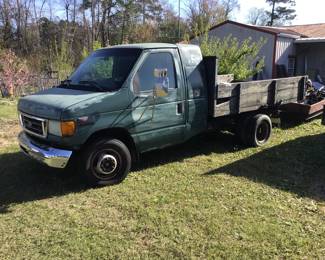 1998 Ford with 350 Turbo-diesel. Bed is steel and 11 feet long and 7 feet wide. 