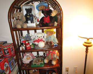 Shelf with collectible bears including Paddington