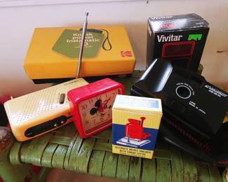 Vintage cameras, clock, radio