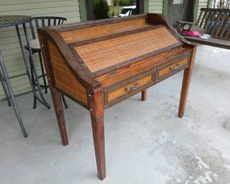 Check out this great secretary! It's not dainty like the normal antique secretaries we sell. This one is all butched up with rattan inlay and leather detailing!  46x22x39.  $160. 