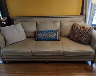 HUGE designer sofa looking for a new home!  A couple of well concealed minor imperfections, but still plenty of cozy evenings left to give!  90x44x34.  $220.