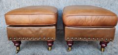 Pair of Leather Master Ottoman Stools Brass Tack Trim on Wood with Brass Casters
