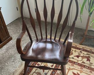 antique rocking chair, bent, wood arms
