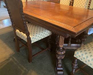 100 year old, antique dining room, table, and chairs