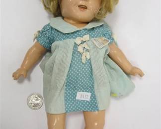 VINTAGE SHIRLEY TEMPLE DOLL.  SLEEP EYES AND OPEN MOUTH WITH TEETH.  SOME CRACKING, NEEDS RE-STRINGING