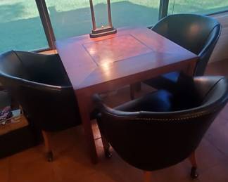 MCM set has 4 barrel rolling chairs.