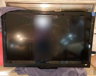 Vizio TV with wall mounting bracket on back