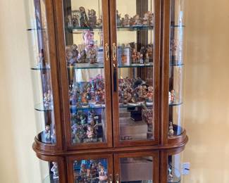 lighted china cabinet FULL of Hummel figures