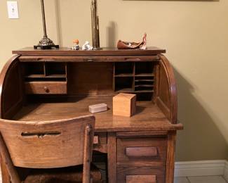 small roll-top desk and chair