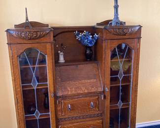 antique drop-front secretary with display cabinets