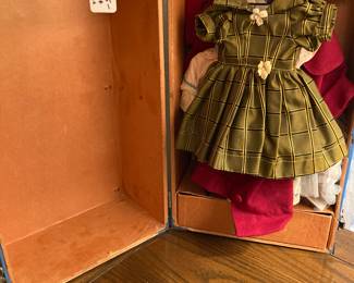 vintage doll clothes in trunk