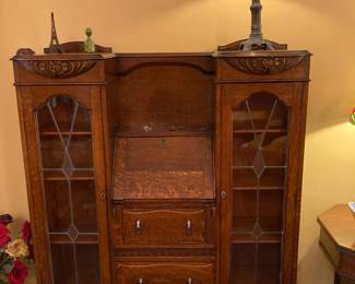 antique drop-front secretary with display cabinet sides