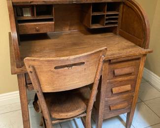 small roll-top desk and chair