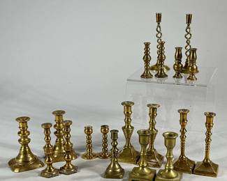 MINIATURE TURNED BRASS CANDLESTICKS | Includes various styles of turned brass candlesticks, 7 pairs, 1 set of 4 and one individual candelstick