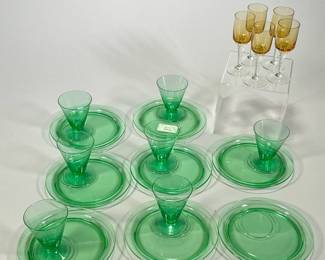 (20PC) MID CENTURY COLORED GLASS | Includes: 8 Green glass saucers and 7 matching green glasses, 5 amber cordial glasses with twisted stems.