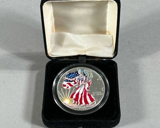 1999 AMERICAN EAGLE COLORIZED SILVER DOLLAR | 1999 Colorized American Eagle pure silver dollar coin Coin diameter: 2in
