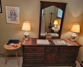 Some costume jewelry. Sumter furniture dresser drawers. 