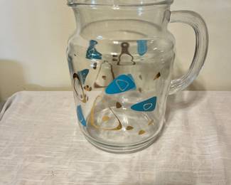 Turquoise  Boomerang pitcher.  Glasses available but we’re victims to the dishwasher! 😡