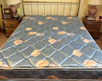 Queen size bed with “brass” headboard