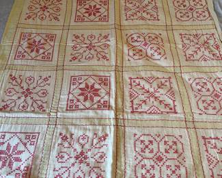 Hand stitched vintage quilt