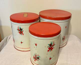 Set of 4 ( found the small one ) metal canisters 