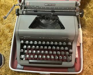 Royal typewriter, and carrying case