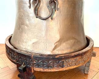 Large Copper Pot With Wrought Iron Handles In Antique Carved Round Wood Stand
Lot #: 17