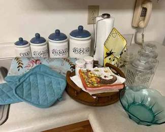 Kitchen Cannisters, Hotpads, Blue Glass Bowl, Cookie Jars And Other Items