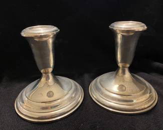 Sterling candle holders.
