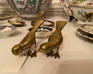 Pair of brass birds.